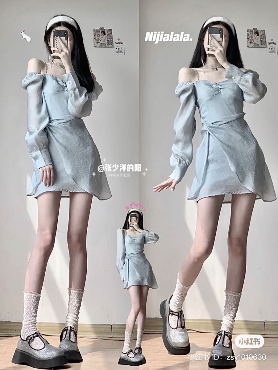 Cô gái trẻ trong váy xanh nổi bật giữa không gian nội thất sang trọng