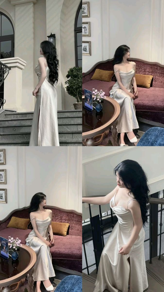 Cô gái xinh đẹp diện đầm satin màu kem ngồi thư giãn trên ghế sofa tím