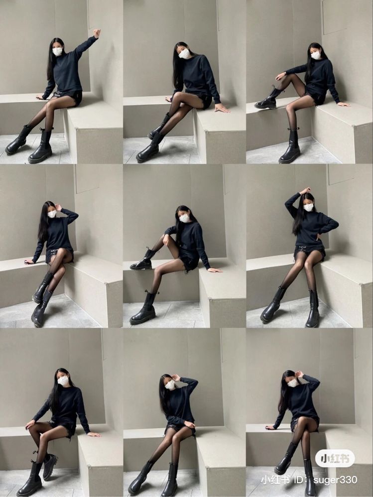 Cô gái xinh đẹp với áo sweater đen và boots cao