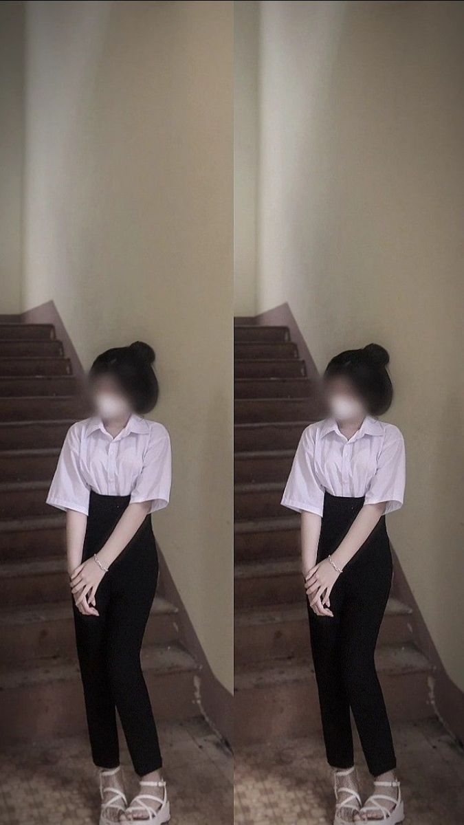 Ảnh gái đứng trên cầu thang với áo sơ mi trắng