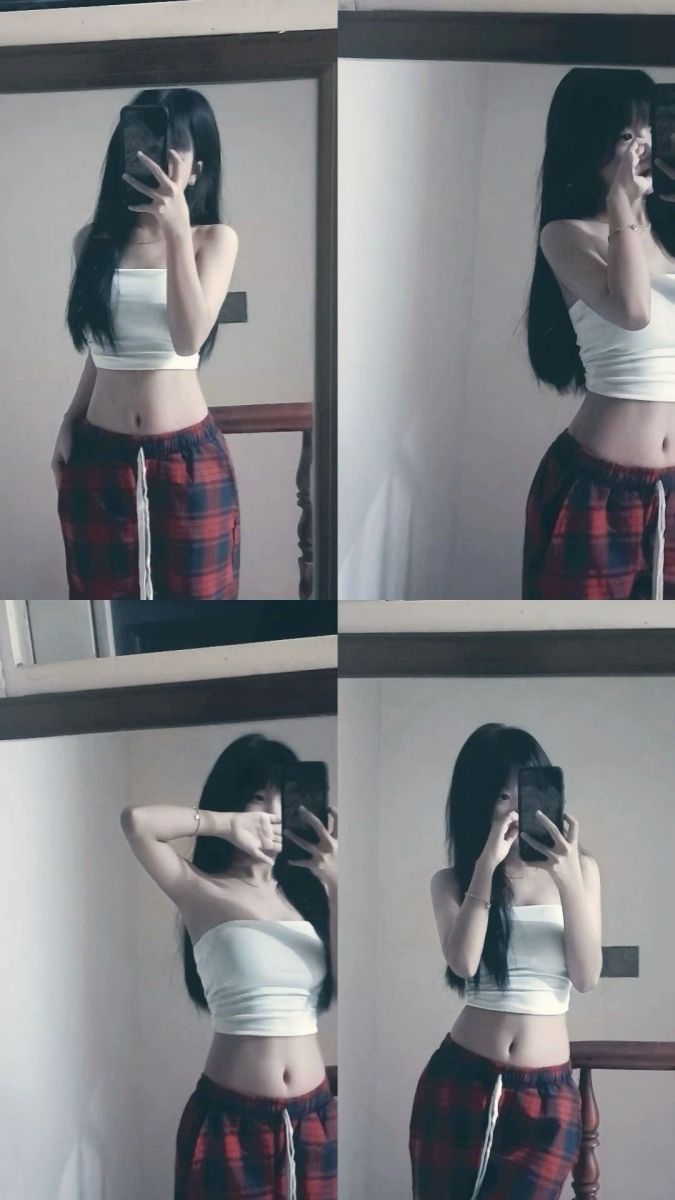 Ảnh gái trẻ mặc áo crop top trắng và quần đùi kẻ sọc