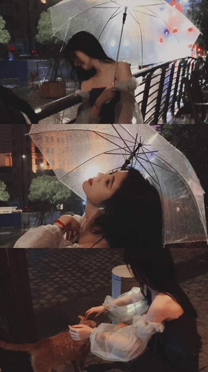 Ảnh gái xinh ngực to chiếc ô sụt tưa cơn mưa