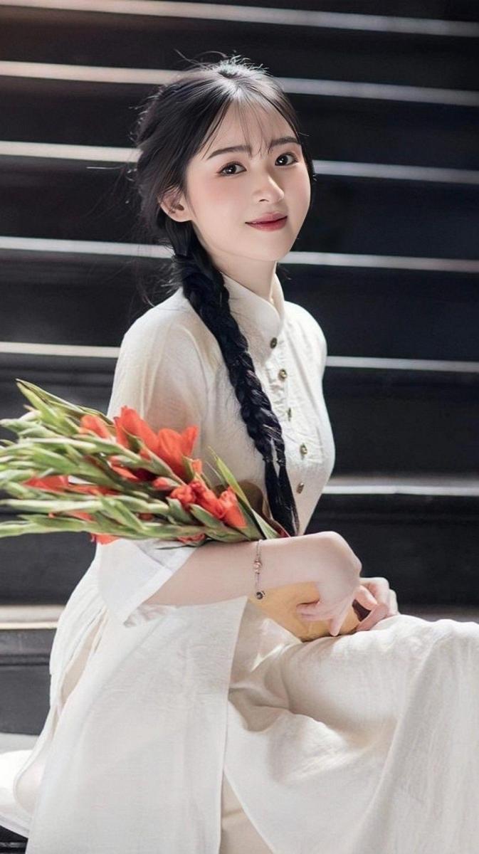 Ảnh đẹp gái xinh với ngực to trong áo dài sắc đẹp