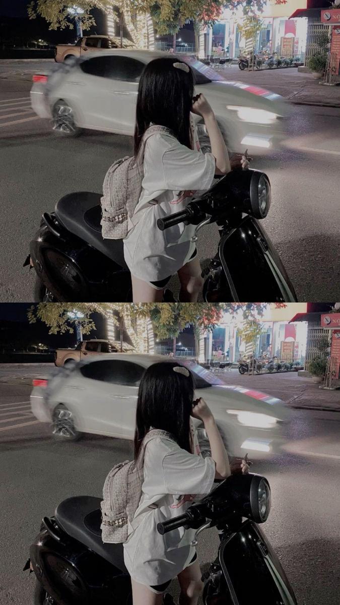 Ảnh gái xinh ngực to trên xe máy tay ga